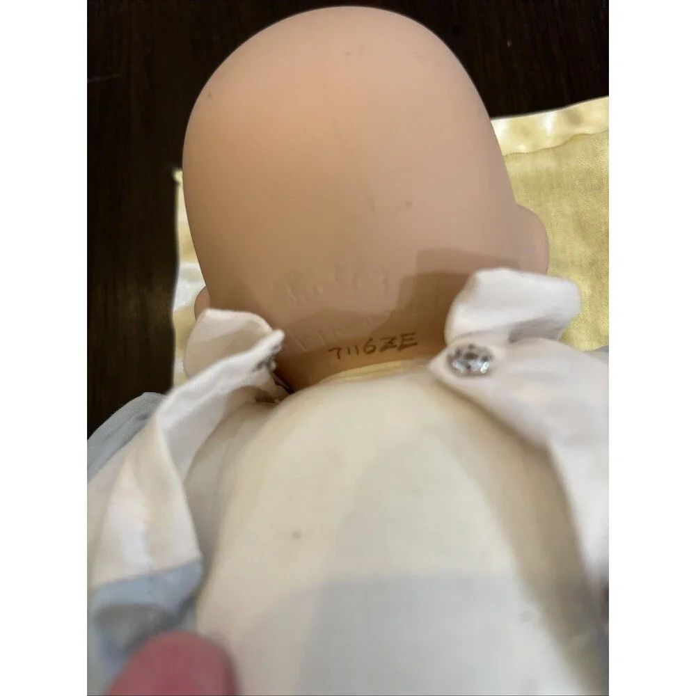 Ashton Drake tickles porcelain